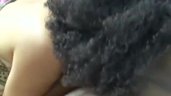 Ebony with curly hair toying and squirting