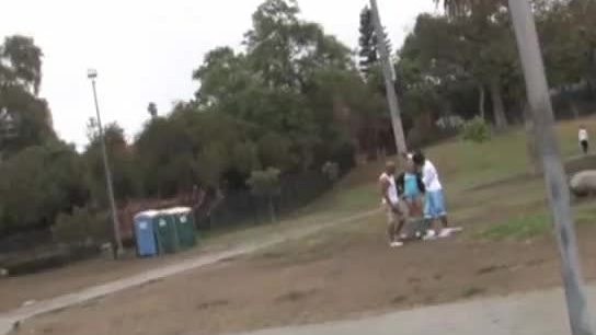 Lisa ann playing basketball with two black dudes