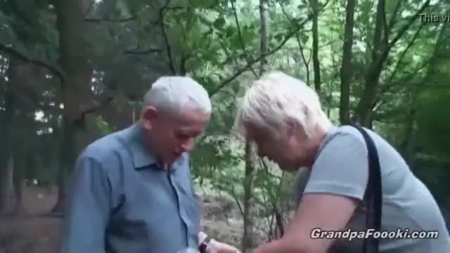 Blonde granny gives blowjob to horny pool boy